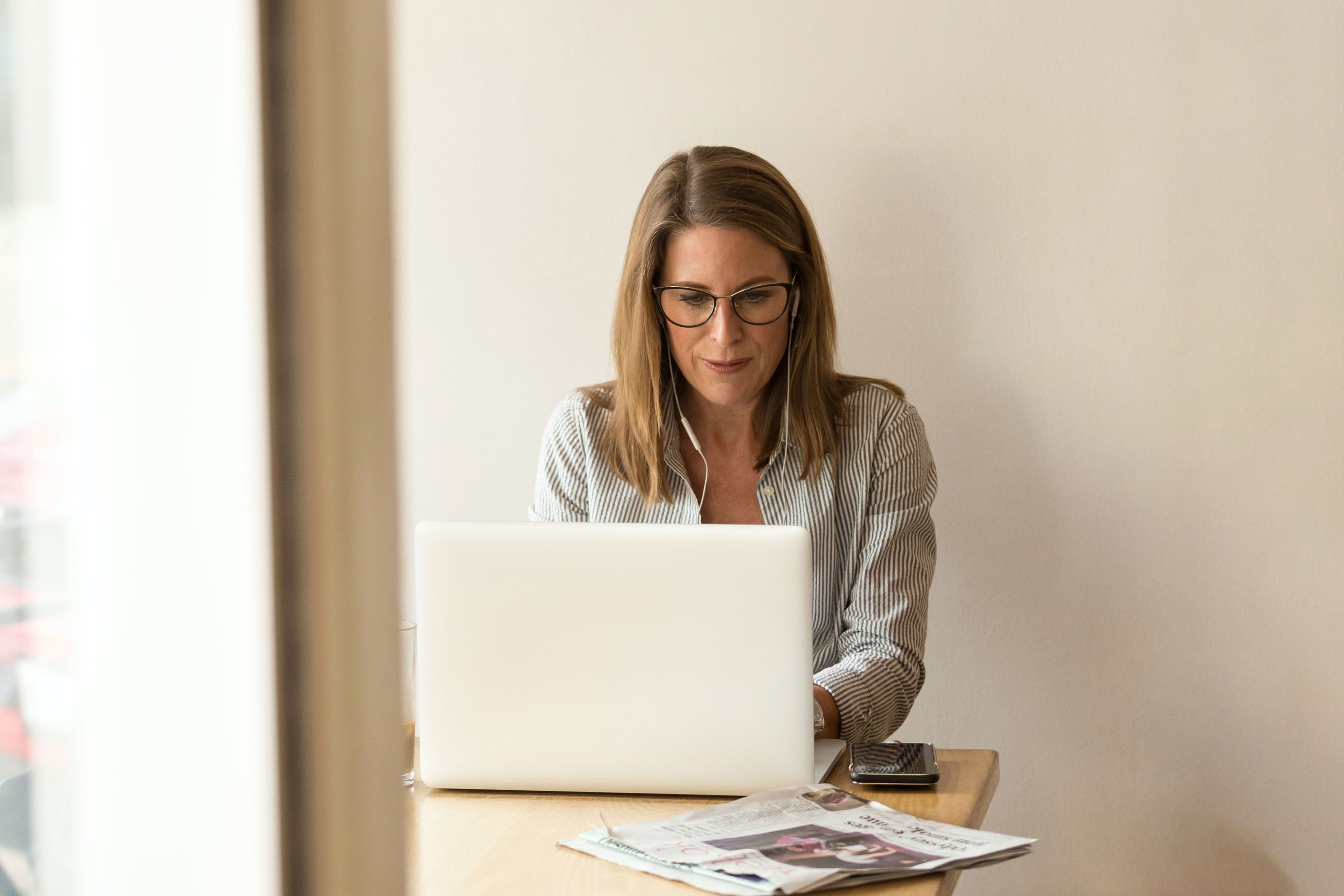 Chief Executive Officer working in a laptop